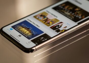 Close-up view of a smartphone featuring a streaming service interface, highlighting technology in modern entertainment.